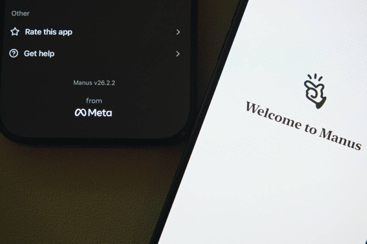 The Manus AI agent app is displayed on mobile phones with the logo of US tech giant Meta in the app interface, in this illustration picture taken on Tuesday. (Reuters)