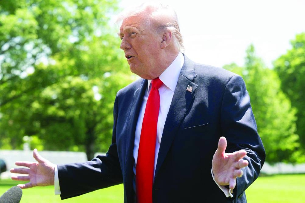 US President Donald Trump speaks with the media prior to departing from the South Lawn of the White House in Washington, DC, May 1, 2026. Trump is going to Florida to speak at an event at The Villages and to attend the Forum Club of the Palm Beaches dinner. (Photo by SAUL LOEB / AFP)