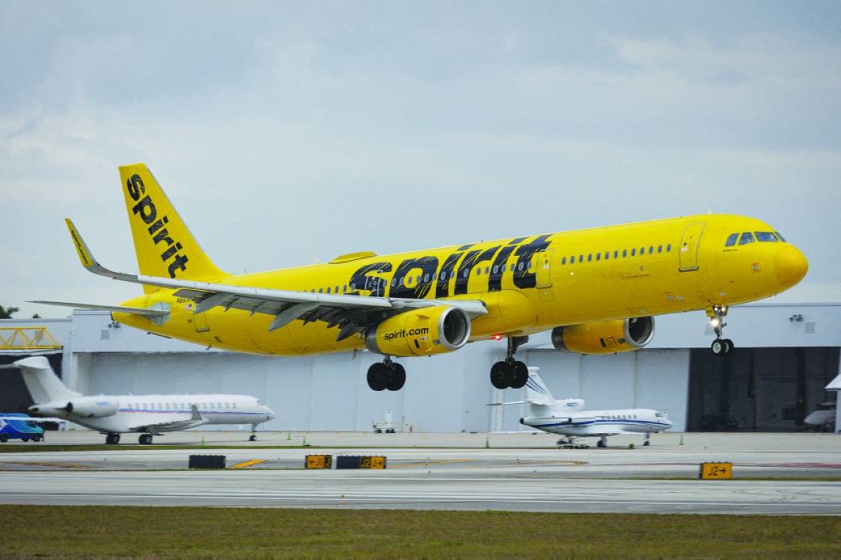 FILE PHOTO: A Spirit Airlines flight arrives at Fort Lauderdale - Hollywood International Airport, in Fort Lauderdale, Florida, U.S., April 23, 2026. REUTERS/Marco Bello/File Photo