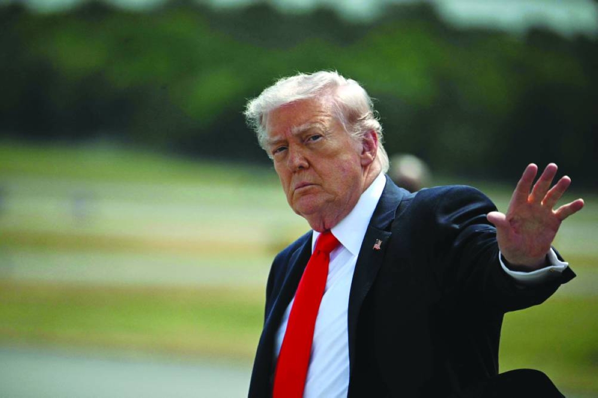 US President Donald Trump on his arrival at Ocala International Airport in Florida. -- AFP