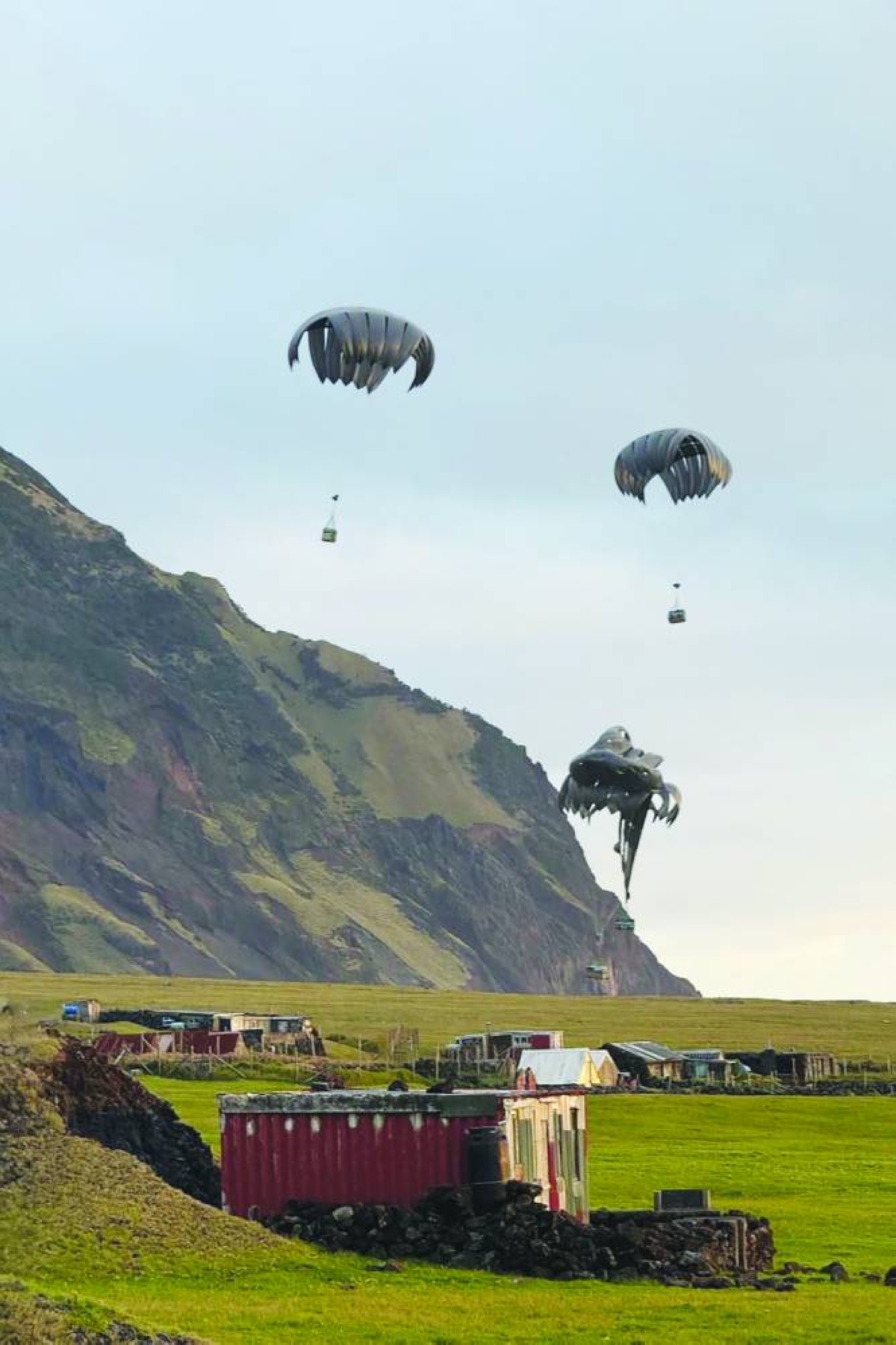In a handout picture released by the British Ministry of Defence Sunday, members of the UK Armed Forces drop medical kit to the Atlantic Island of Tristan Da Cunha to provide assistance to a British National who contracted hantavirus aboard an Atlantic expedition cruise ship, MV Hondius. (AFP)