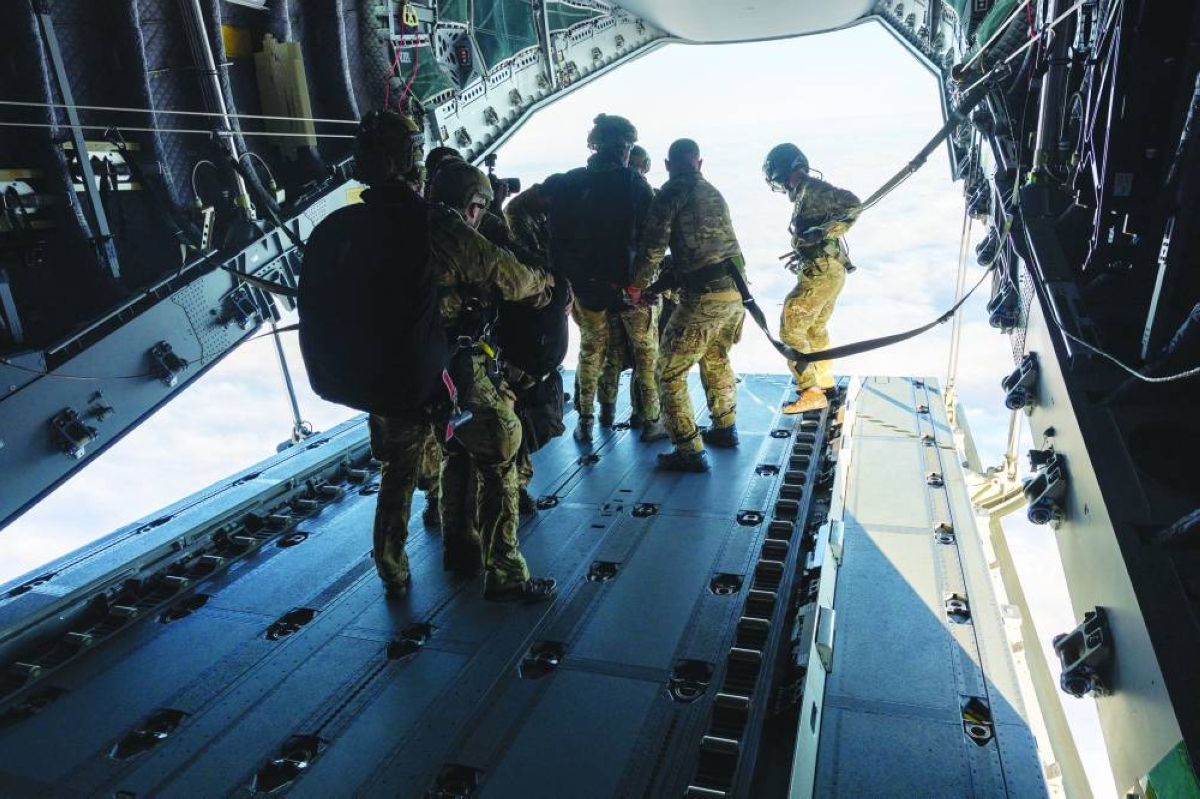 RAF A400 drops air assault paras and medical supplies into British Overseas Territory from Ascension Island to provide medical support to people. (Reuters)