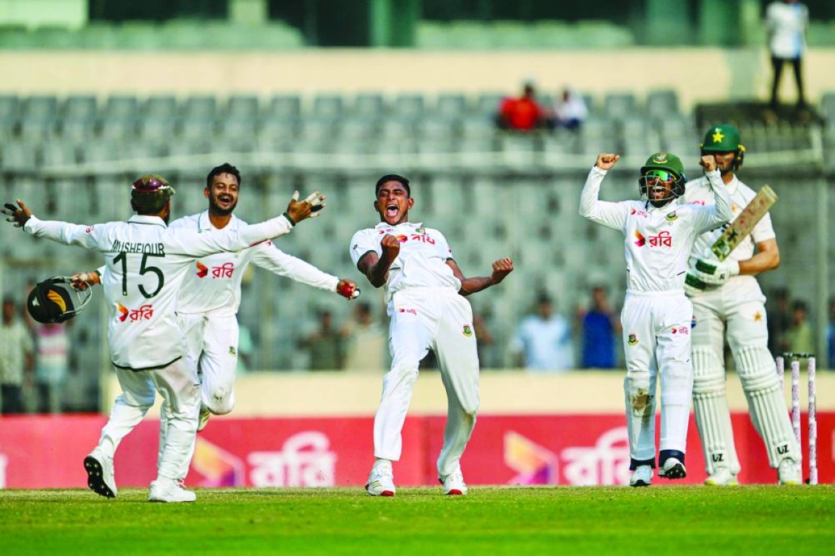 Bangladesh's Nahid Rana (C) celebrates with teammates their team's win at the end of the fifth day of the first Test cricket match between Bangladesh and Pakistan at the Sher-e-Bangla National Stadium in Mirpur on May 12, 2026. (AFP)