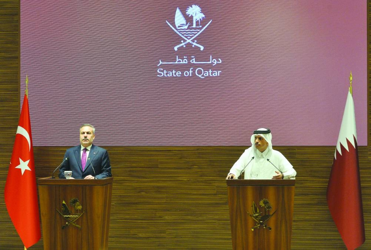 (From left) Hakan Fidan and His Excellency Sheikh Mohamed bin Abdulrahman bin Jassim al-Thani at the press conference Tuesday. 
PICTURES: Shaji Kayamkulam