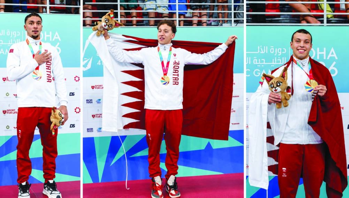 Qatar’s swimmers Mohamed Mahmoud (left), Saadeddin (centre) and Emile Fouzai celebrate with their gold medals at the 4th GCC Games Doha 2026 Tuesday.