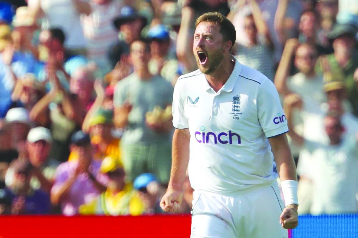 England's Ollie Robinson celebrates after taking the wicket of Australia's David Warner on day four of the first Ashes cricket Test match between England and Australia at Edgbaston in Birmingham, central England on June 19, 2023. England's paceman Ollie Robinson is back in the squad following a two-year exile for their first Test against New Zealand at Lord's. (AFP/File picture)