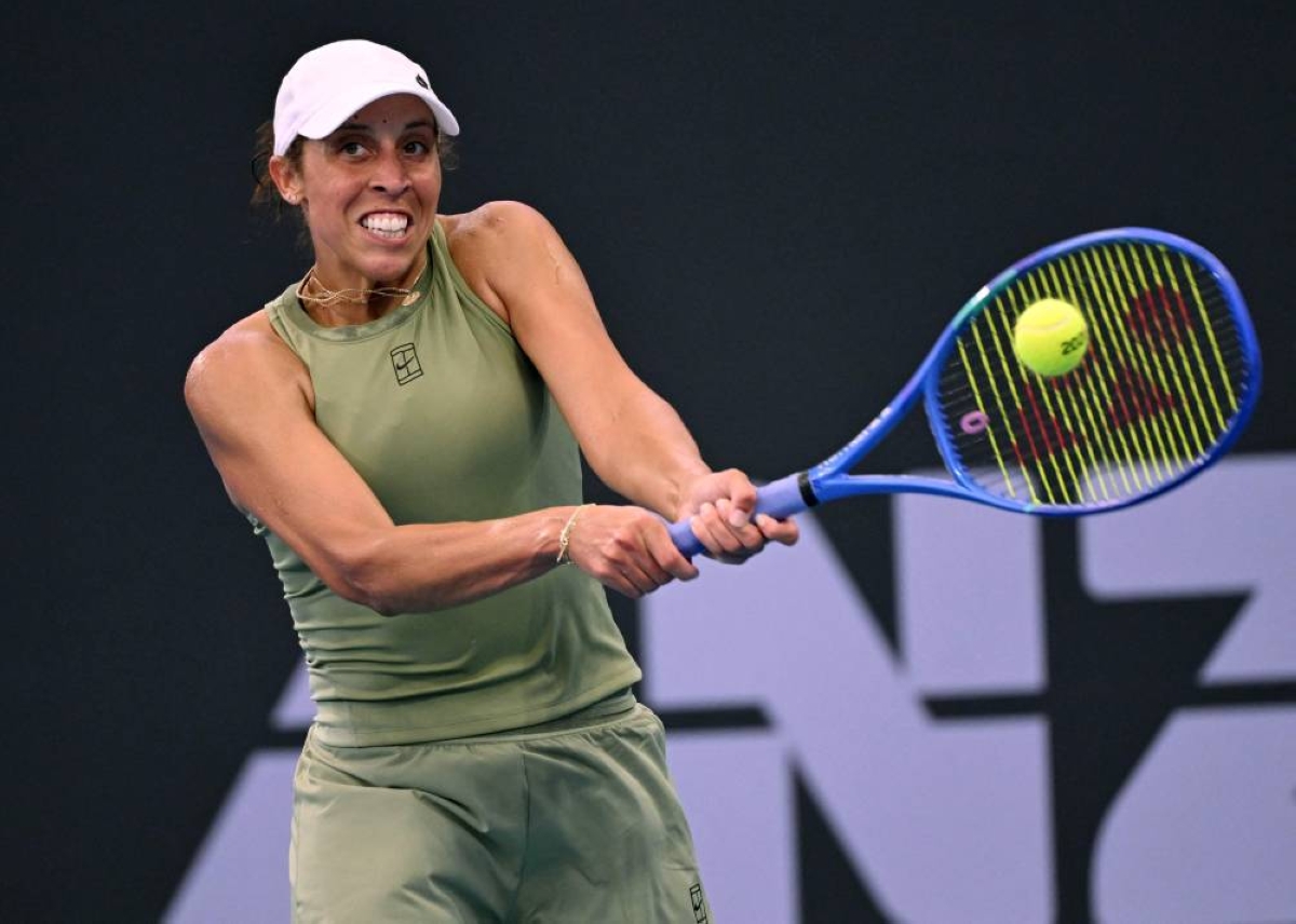 Madison Keys of the US hits a return during her women's singles match against Aryna Sabalenka of Belarus at the Brisbane International tennis tournament in Brisbane on January 9, 2026. Passing through Paris to play the Clarins Trophy, a tournament on the secondary circuit, USA's Madison Keys (former world No. 5, currently No. 19) said in an interview with AFP that “many players” would be prepared to boycott a Grand Slam to put pressure on the four major tournaments. (AFP/File picture)