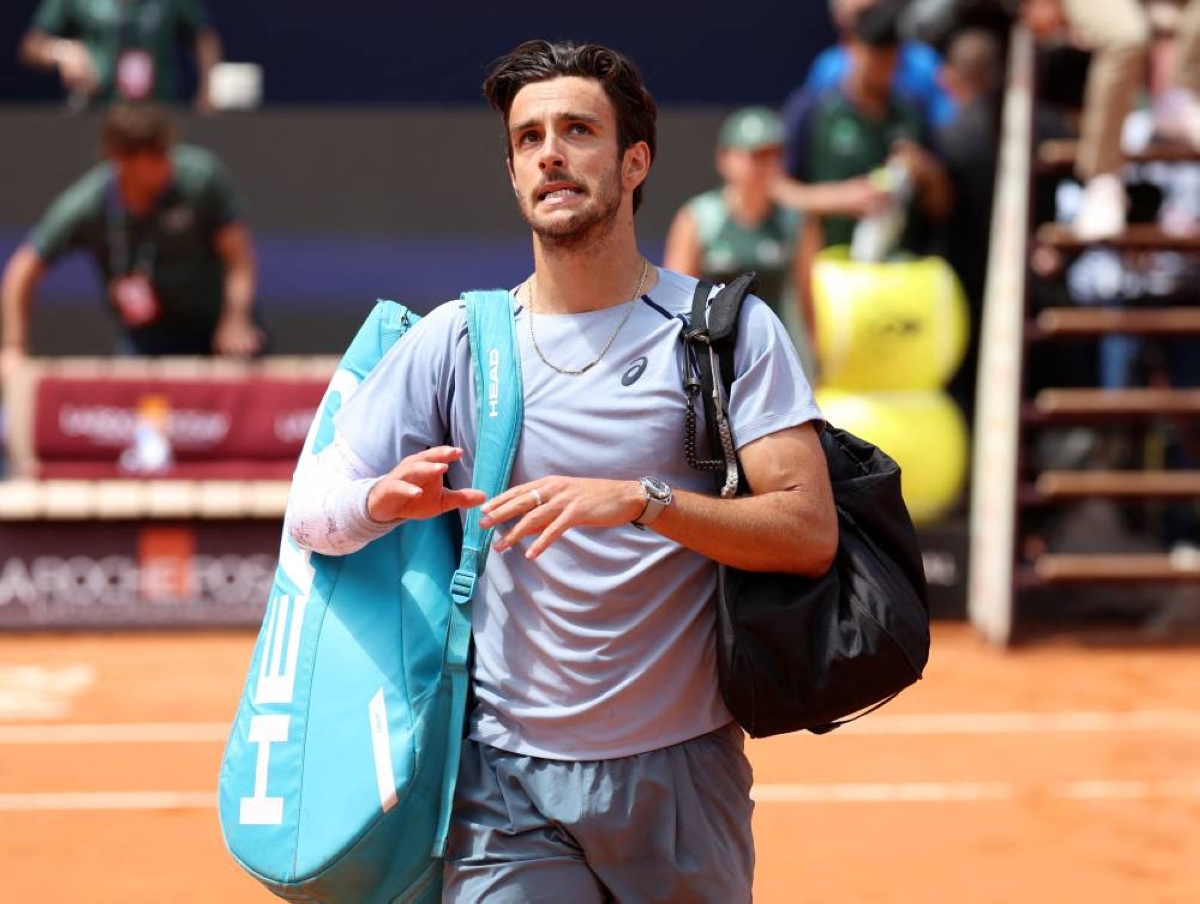 Italy's Lorenzo Musetti looks dejected after losing his round of 16 match against Norway's Casper Ruud at the Italian Open in Rome, Italy, on May 12, 2026. (Reuters)