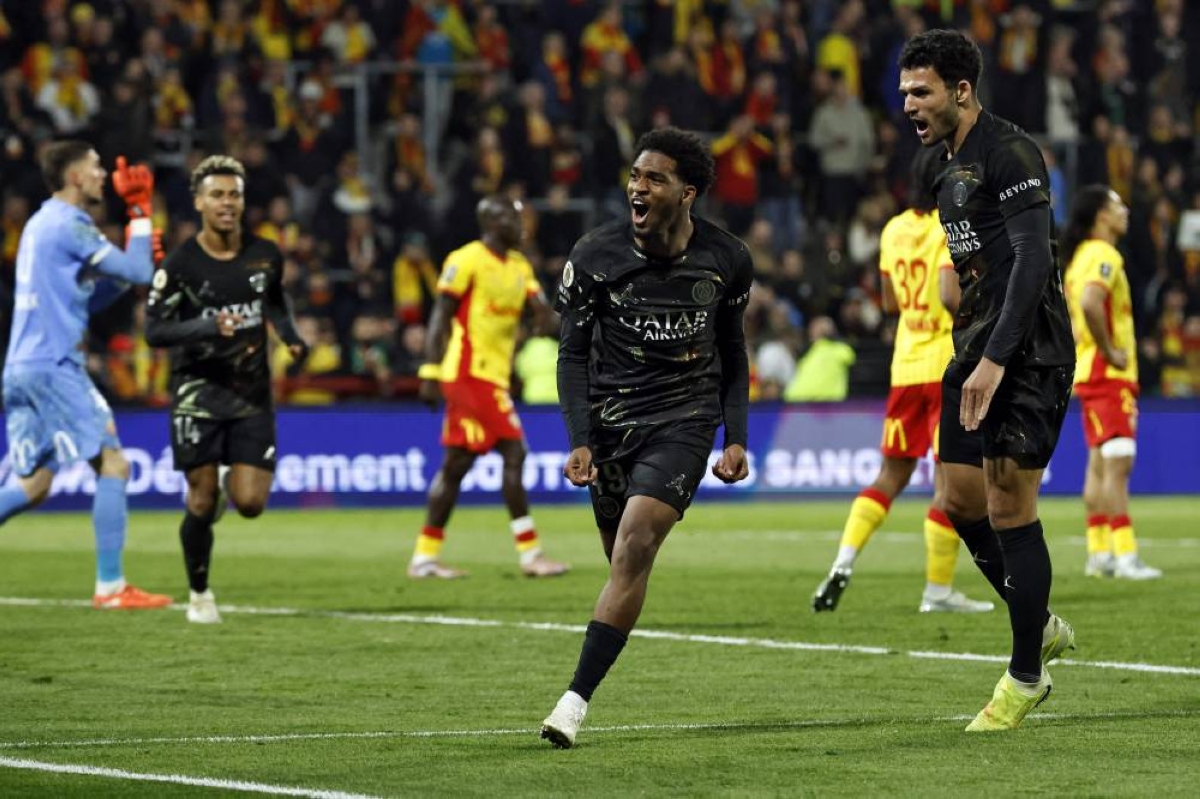 Paris Saint-Germain's Ibrahim Mbaye celebrates after scoring a goal during the Ligue 1 match against Lens at the Stade Bollaert-Delelis stadium in Lens on May 13, 2026. (AFP)