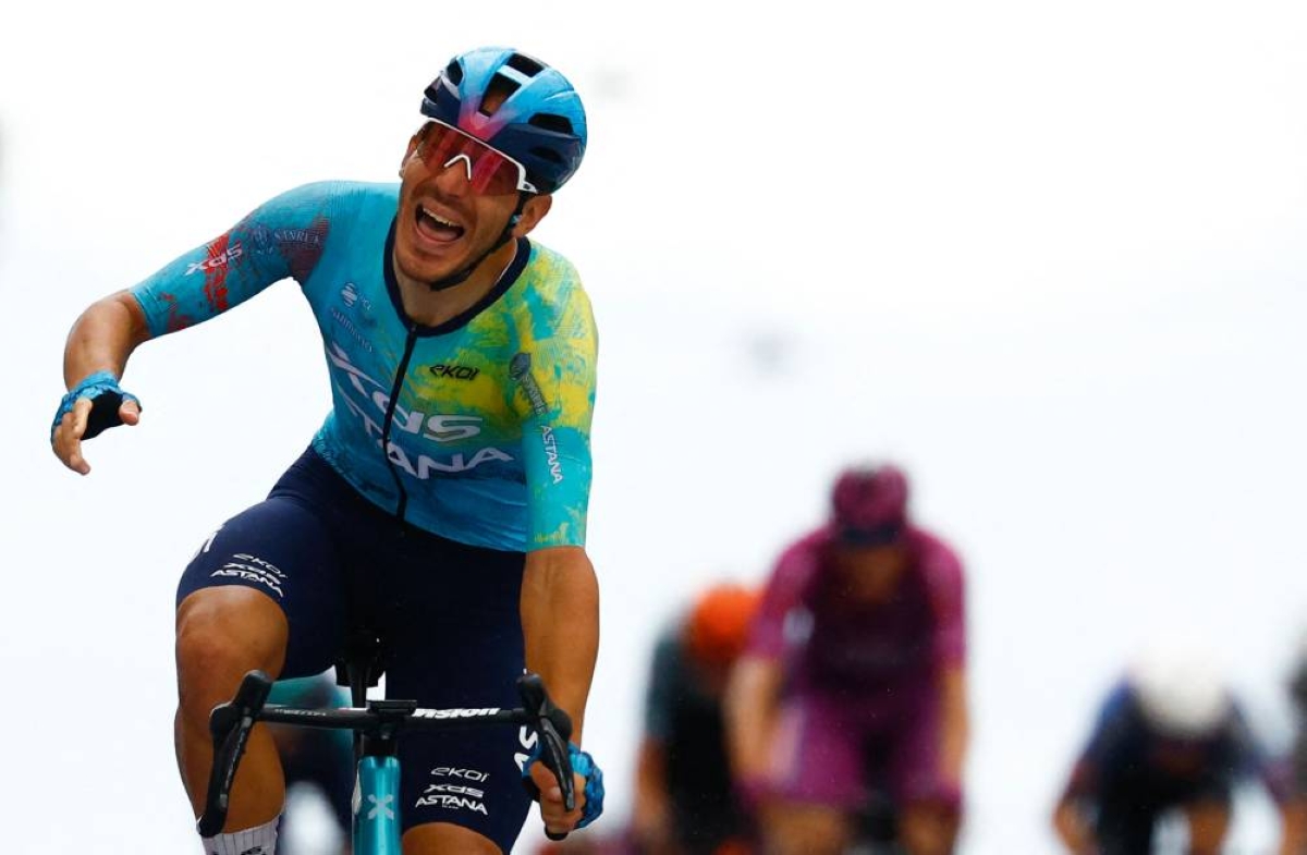 XDS Astana Team Italian rider Davide Ballerini celebrates as he crosses the finish line to win in the 6th stage of the Giro d'Italia in Naples, Italy, on May 14, 2026. (AFP)