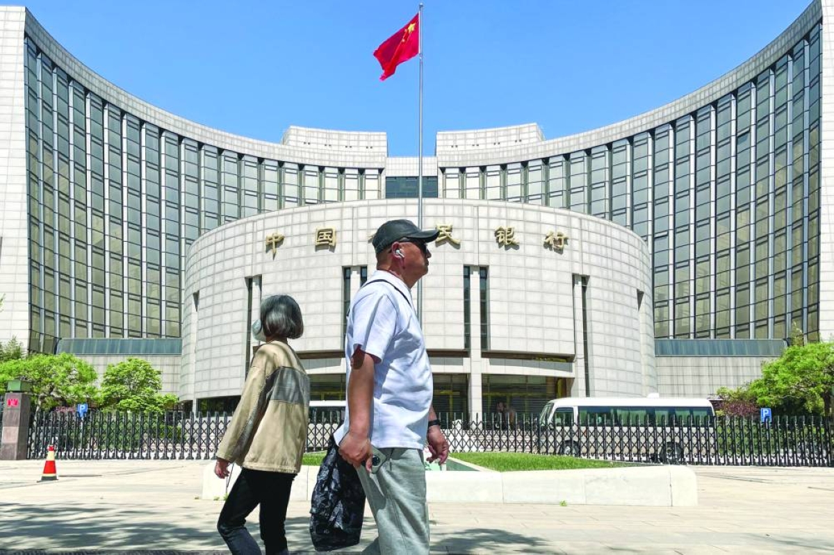 
The People’s Bank of China building in Beijing. China’s credit expansion slowed far more than expected from a year earlier in April while banks extended less new loans, underscoring unusually anemic borrowing demand even for a typically slow month for lending. 