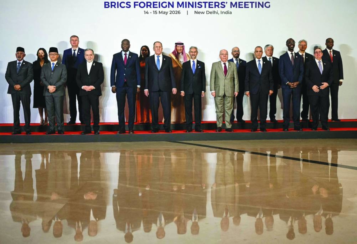 (Left-Right, front) Indonesia's Foreign Minister Sugiono, Iran's Foreign Minister Abbas Araghchi, South Africa's Foreign Minister Ronald Lamola, Russia's Foreign Minister Sergey Lavrov, India's Foreign Minister Subrahmanyam Jaishankar, Brazil's Foreign Minister Mauro Vieira, Egypt's Foreign Minister Badr Abdelatty, Ethiopia's Foreign Minister Gedion Timothewos and Cuba's Foreign Minister Bruno Rodríguez Parrilla pose for a family photograph with delegates of partner countries during the Brics Foreign Ministers’ meeting at the Bharat Mandapam in New Delhi Thursday. (AFP)
