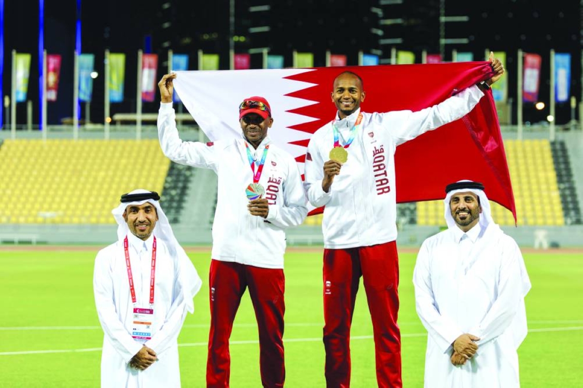 Mutaz Barshim and his father Essa Barshim pose proudly with their medals after a memorable night at the 4th GCC Games Doha 2026. While Mutaz claimed high jump gold, Essa secured silver in the 5,000m race walk at Suhaim Bin Hamad Stadium, Qatar Sports Club.