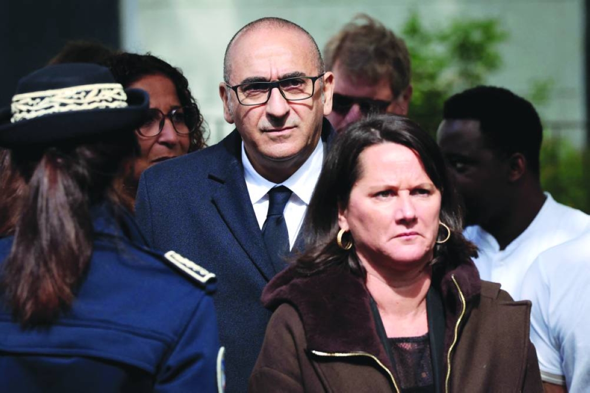 France's Interior Minister Laurent Nunez (C) and Mayor of Nantes Johanna Rolland (R) arrive in the Port-Boyer neighbourhood in Nantes, western France, on May 15, 2026, a day after a shooting in a building of a residential complex killed a 15-year-old and injured two other minors. A teenager of about fifteen was shot and killed on the evening of May 14, and two other minors were wounded in a working-class neighborhood of Nantes, which had already been hit by deadly shootings linked to drug trafficking at the end of April. The shooting occurred around 7:30 p.m. in an apartment building, and the suspected shooters, who arrived on a motorcycle, fled the scene, according to multiple sources close to the investigation. The deceased teenager was shot in the heart, these sources confirmed. The two wounded teenagers, who were taken to the hospital, are not in life-threatening condition, according to a source close to the investigation. They are reportedly 13 and 14 years old. (Photo by FRED TANNEAU / AFP)