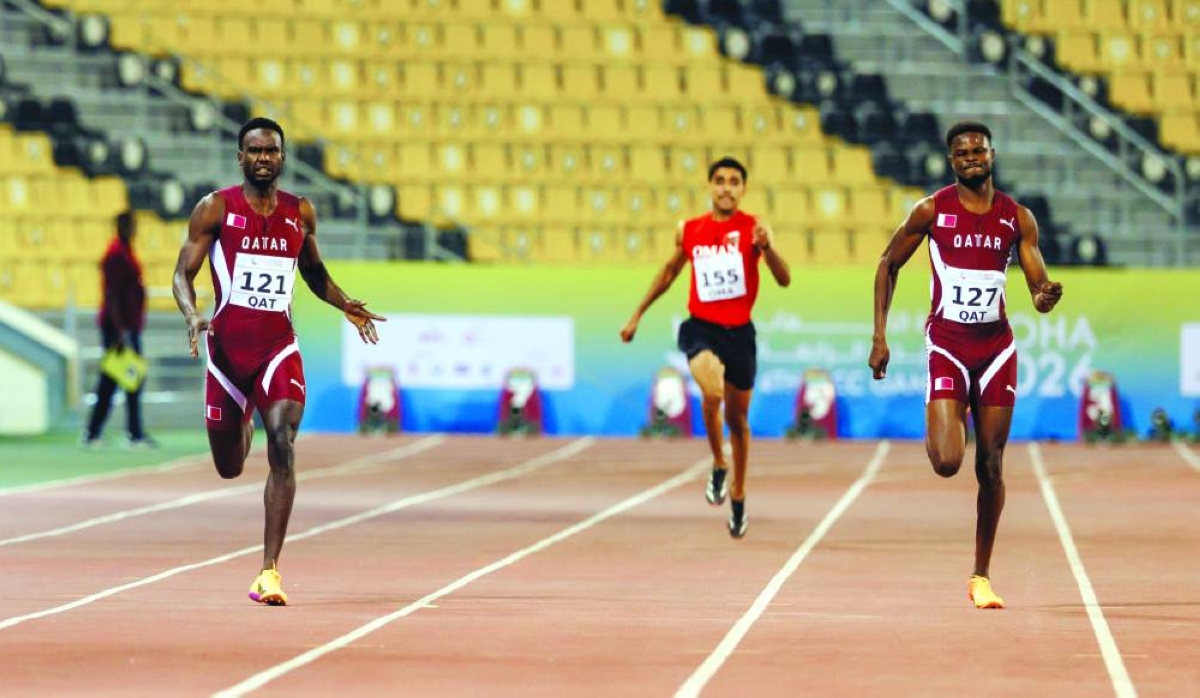 
Qatar’s Ammar Ibrahim (left) producing a stunning run to win the men’s 400m title in ahead of compatriot Ashraf Osman at the Qatar Sports Club. 