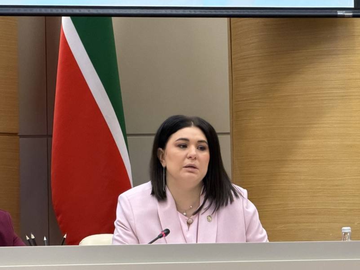 Taliya Minullina addresses the media at the Tatarstan government headquarters in Kazan, Russia.
