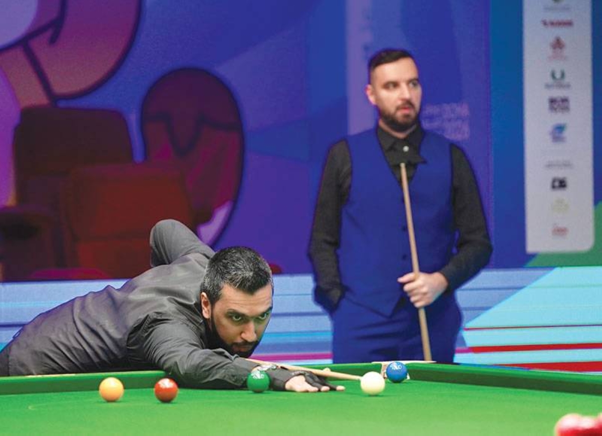 Team Qatar player Ali al-Obaidli in action during the men’s 6-red snooker singles competition at the billiards and snooker events.
