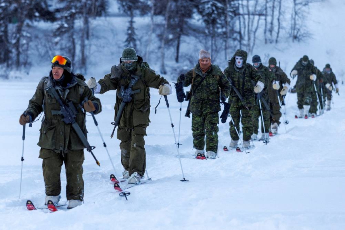 FILE PHOTO: Members of 41 Canadian Brigade Group, as part of Task Force Grizzly, patrol on skis as Canadian Armed Forces deploy to "Operation Nanook-Nunalivut," a yearly series of drills designed to highlight the military's ability to defend the Canadian Arctic, in Yellowknife, Northwest Territories, Canada, February 16, 2026. REUTERS/Carlos Osorio/File Photo/File Photo