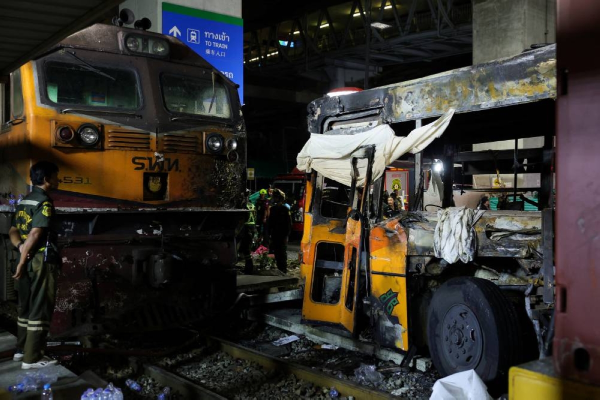A view of a train and a bus after their collision with several cars on Asok-Din Daeng Road, causing several casualties, in Bangkok, Thailand, on Saturday. (Reuters)