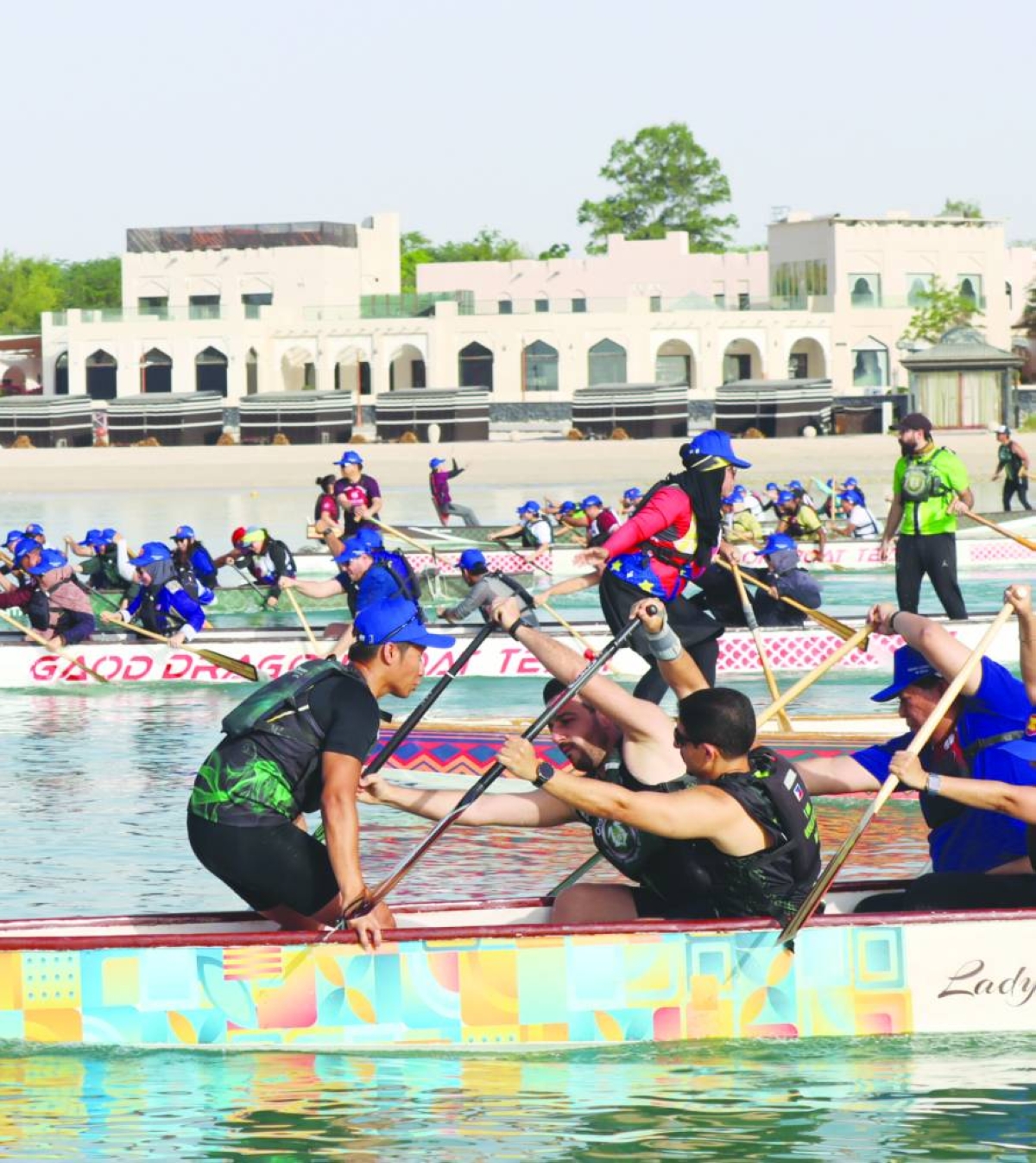 Teams rowed in unison along the Katara shoreline, showcasing coordination and camaraderie at the event.