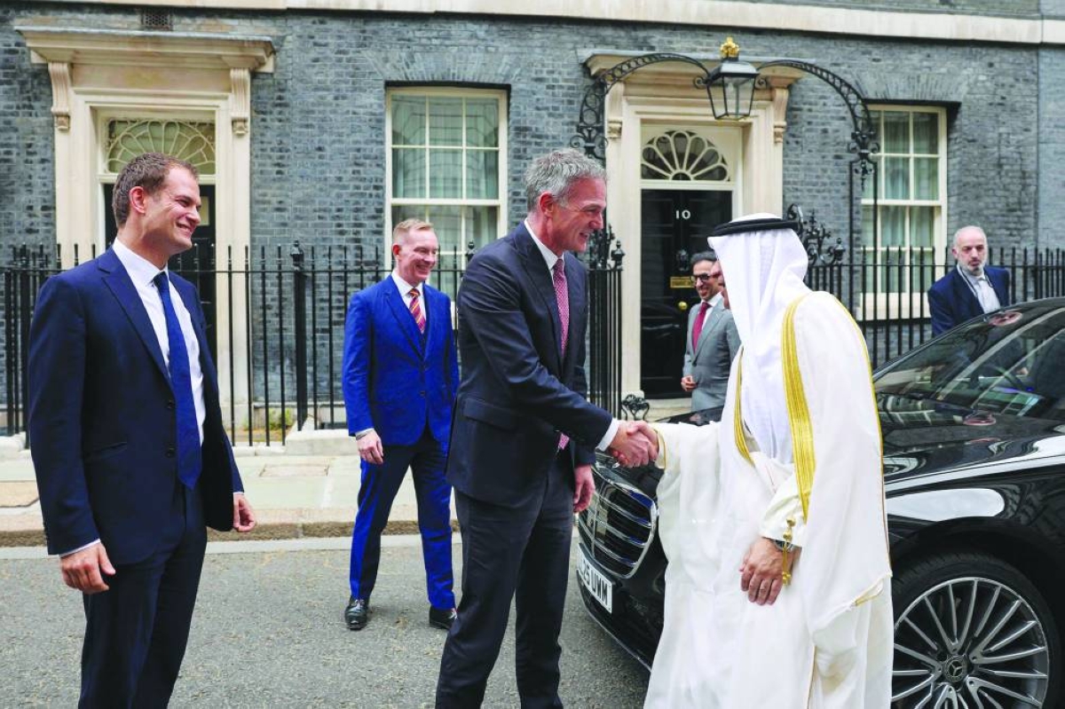 Jasem Mohamed Albudaiwi (front right), secretary general of the Gulf Cooperation Council, is greeted by Britain's Business Secretary Peter Kyle (centre), British Minister of State for Trade Chris Bryant (behind second left) and Britain's Parliamentary Under-Secretary of State for the Middle East Hamish Falconer (front left) as he arrives at Downing Street in London Wednesday. (AFP)