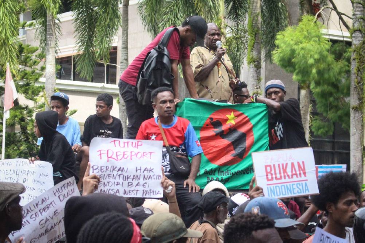 Indigenous Papuans and university students take part in a protest against the government’s National Strategic Projects (PSN) and increased military presence in Papua, which demonstrators say threaten traditional lands and the rights of Indigenous Papuans, outside the Southwest Papua governor’s office in Sorong Thursday. (AFP)