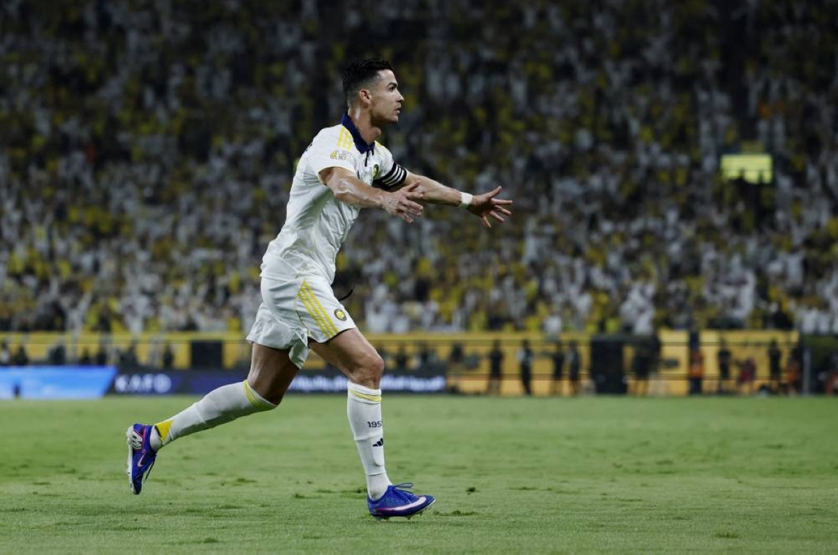 Al Nassr's Cristiano Ronaldo celebrates after scoring against Damac during the Saudi Pro League match in Riyadh. (Reuters)