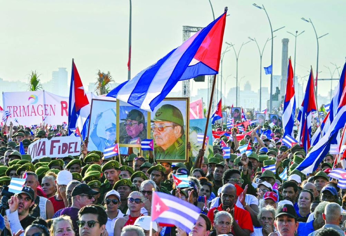 People attend a rally in support of former Cuban president Raul Castro, 94, who has been indicted by a US court, outside the US Embassy in Havana on May 22, 2026. (Photo by ADALBERTO ROQUE / AFP)