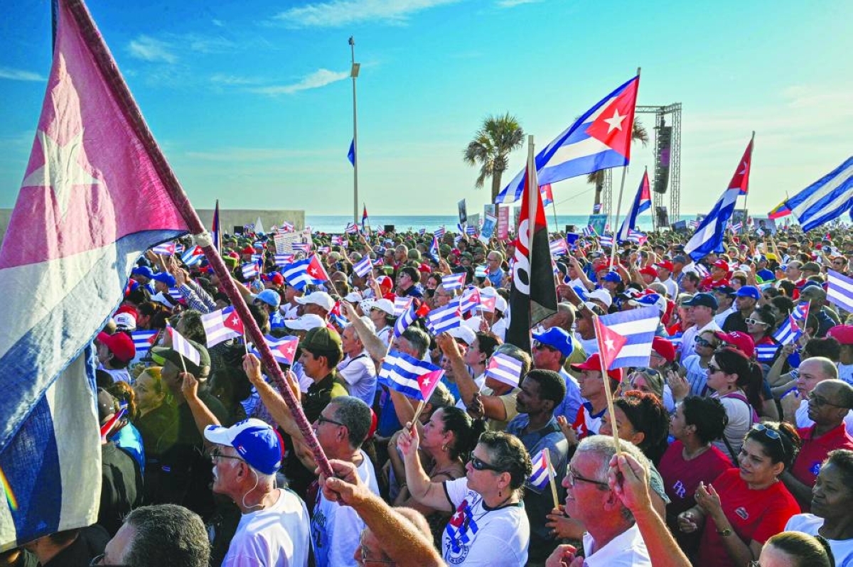 People attend a rally in support of former Cuban president Raul Castro, 94, who has been indicted by a US court, outside the US Embassy in Havana on May 22, 2026. (Photo by ADALBERTO ROQUE / AFP)