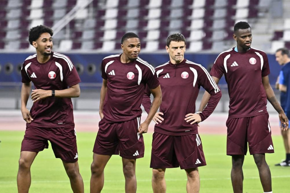 Qatar players during a team training session at the Khalifa International Stadium in Doha on Sunday. 
