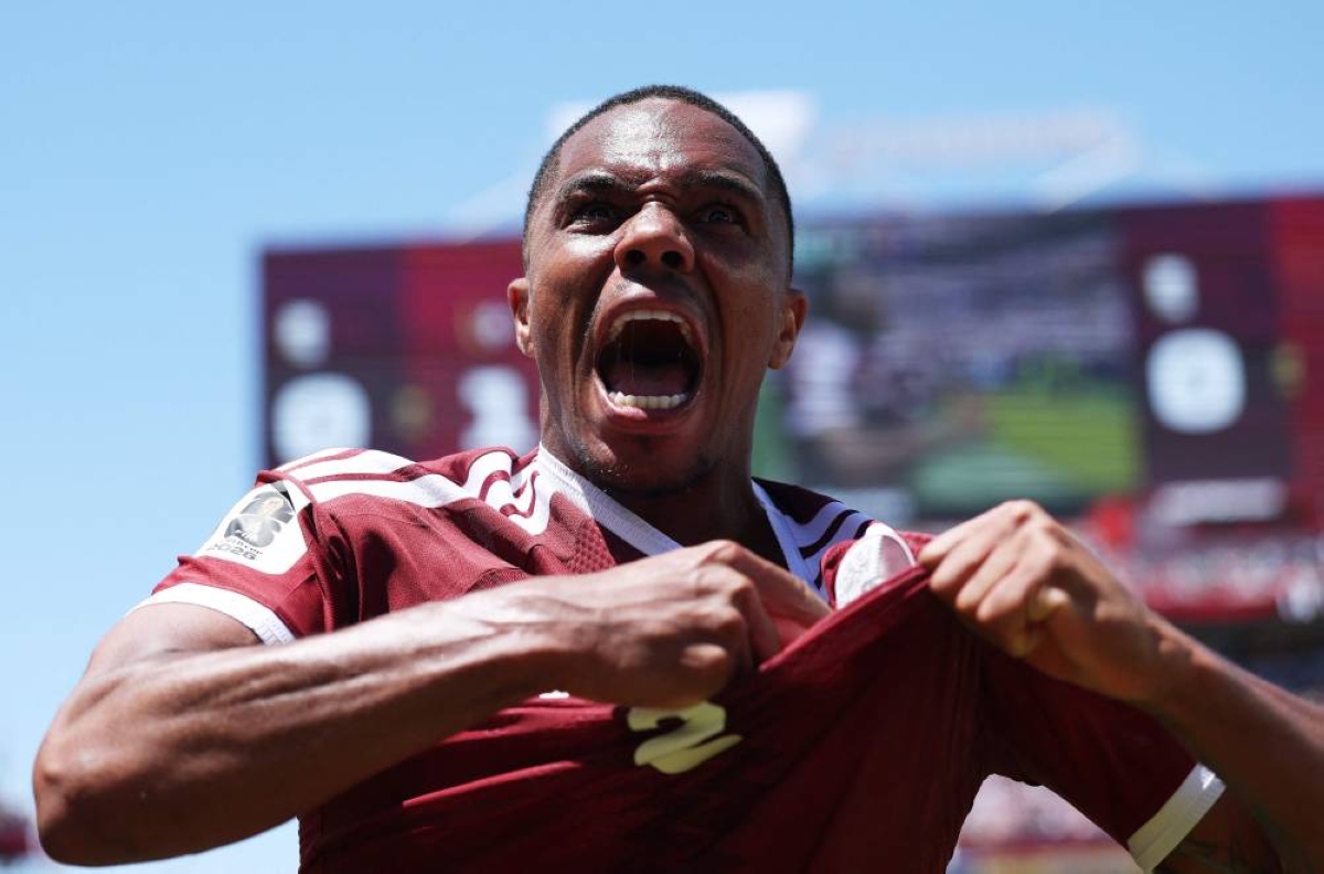 Qatar score late to clinch draw with stunned Switzerland