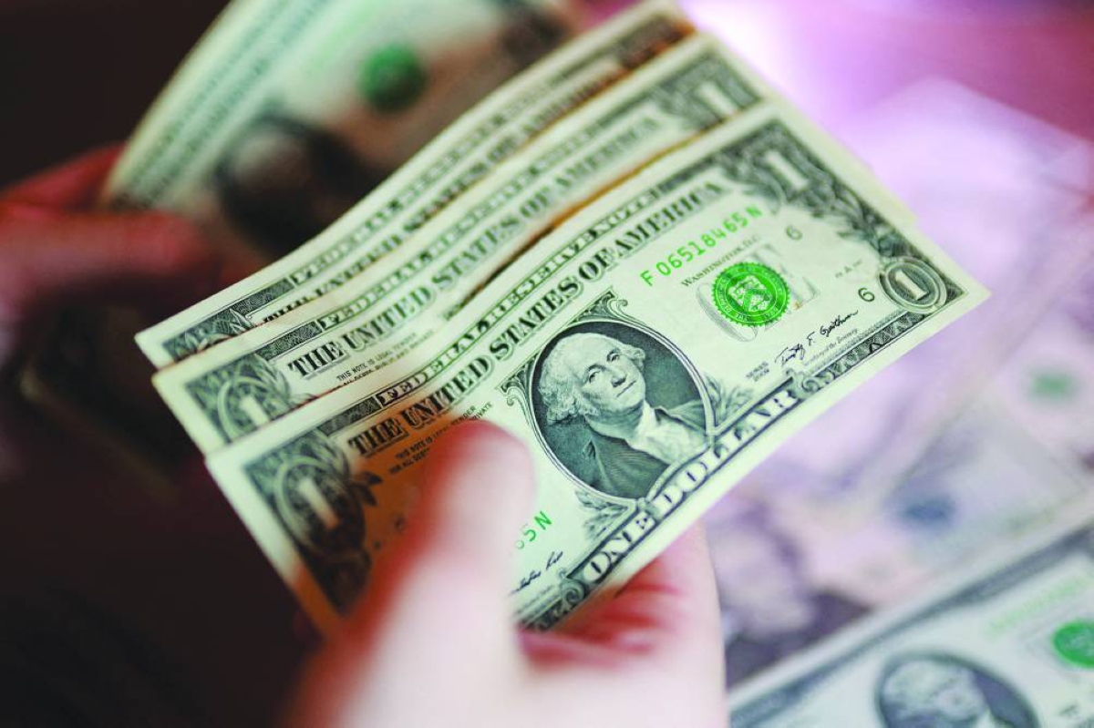 Oil slide softens dollar's inflationary bite