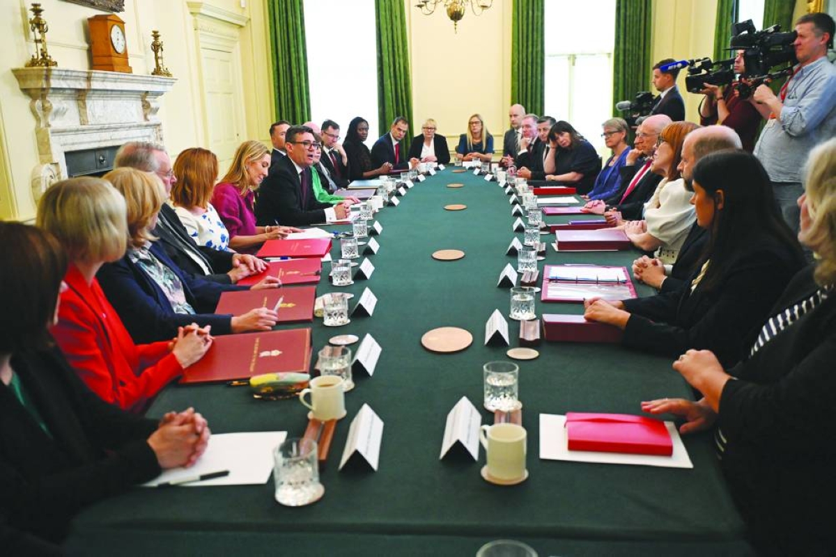 UK PM Burnham unveils energy tax cut, tells ministers to cut living costs