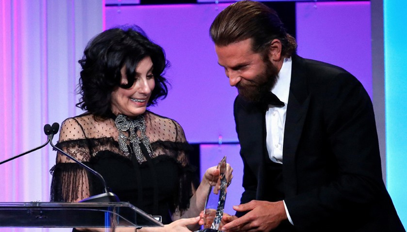 Actor Bradley Cooper presents Sue Kroll with the Sid Grauman Award