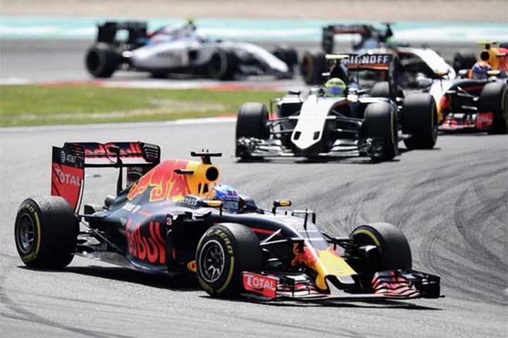 Red Bull Racing\'s Australian driver Daniel Ricciardo takes a corner during the Formula One race

