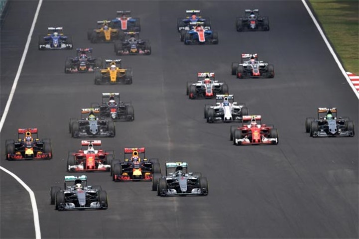 British driver Lewis Hamilton (left front) leads the race before his engine exploded