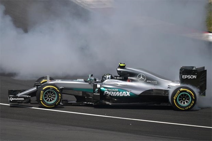 German driver Nico Rosberg faces the wrong direction, after spinning at the start of the grand prix 