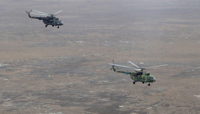 Russian search and rescue team helicopters fly from the Kazakh town of Karaganda to Dzhezkazgan