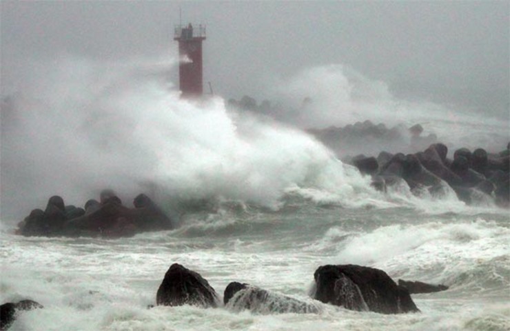 Large waves caused by Typhoon Chaba pound the coast in the southeastern city of Ulsan on Wednesday