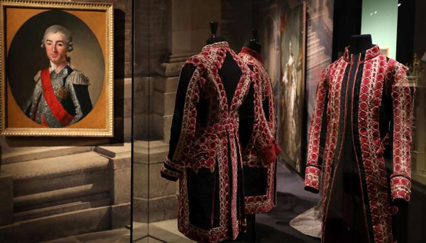 Mannequins with clothing worn at the royal court of French Kings in Versailles - on display