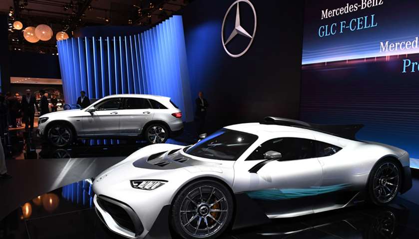 Mercedes-AMG Project ONE (front) and Mercedes-Benz GLC F-Cell (rear) cars are seen on display at the