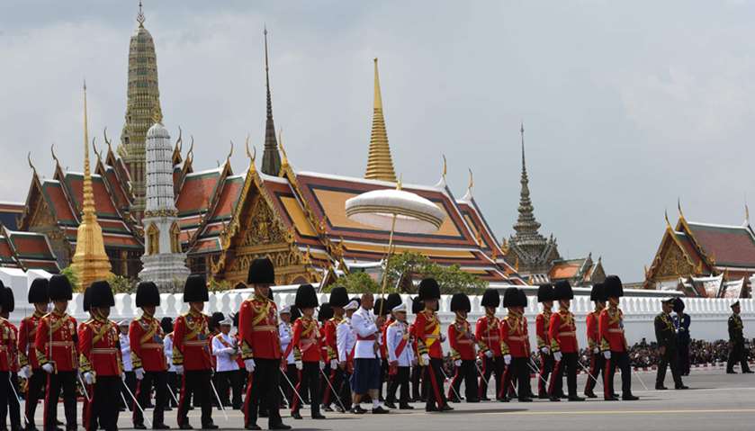 Thai King Maha Vajiralongkorn (C) attends the funeral procession of the late Thai king Bhumibol Adul