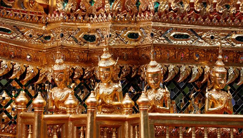 Religious statues decorate the Great Victory Chariot carrying the Royal Urn of Thailand\'s late King 