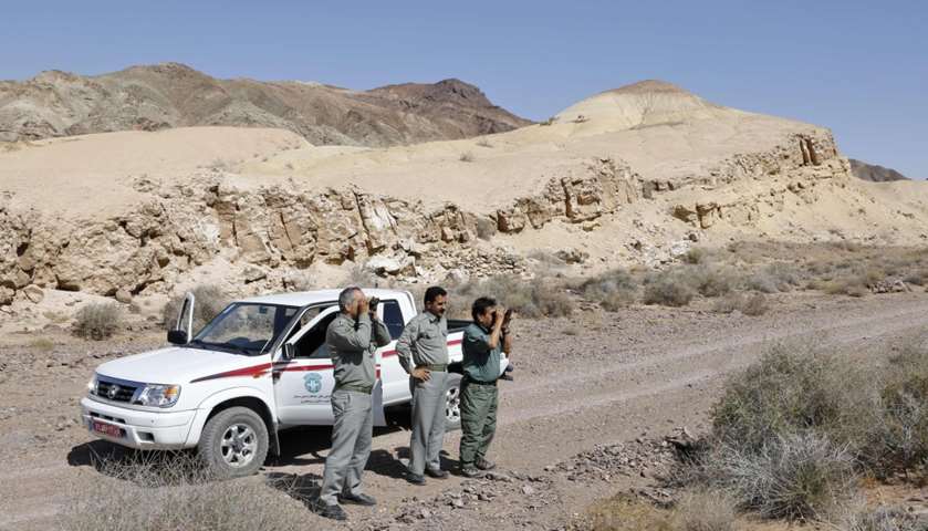 Rangers search for Asiatic Cheetahs in the Desert National Park in Garmsar