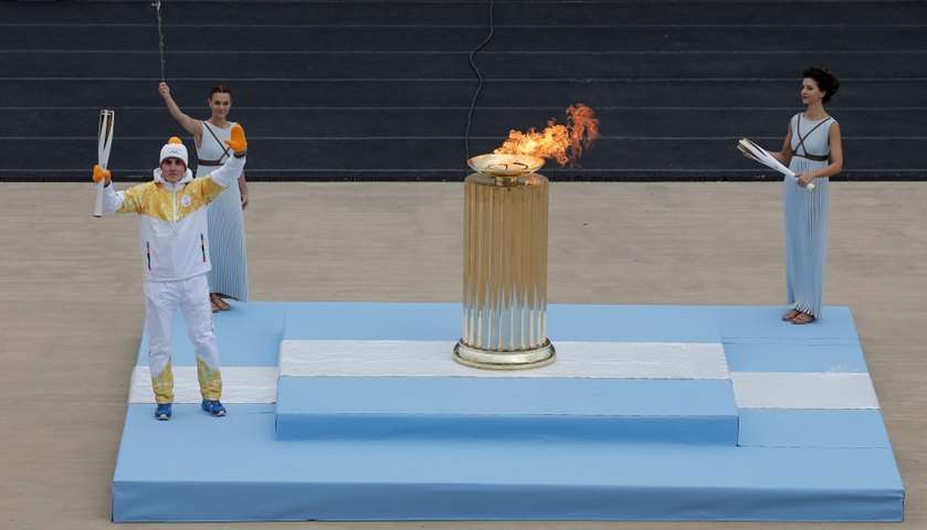 Greek alpine skiing athlete Ioannis Proios during the flame handover ceremony