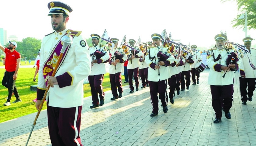 A band leading the 1km walk
