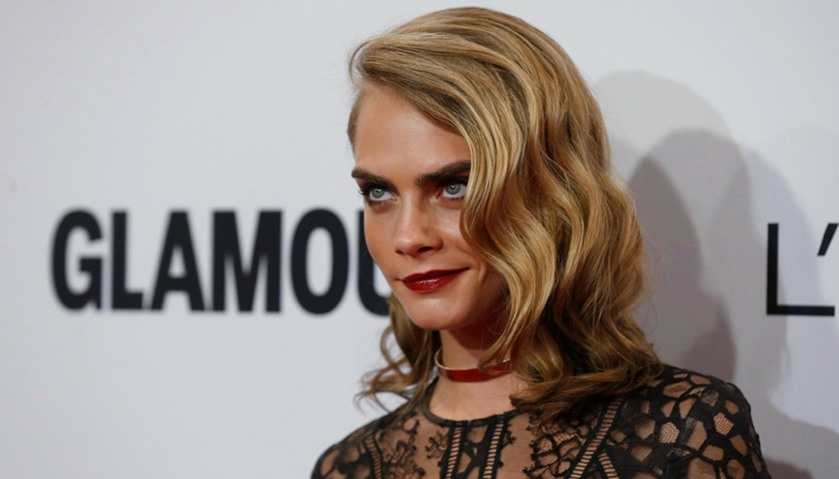 Model Cara Delevingne poses at the Glamour Women of the Year Awards