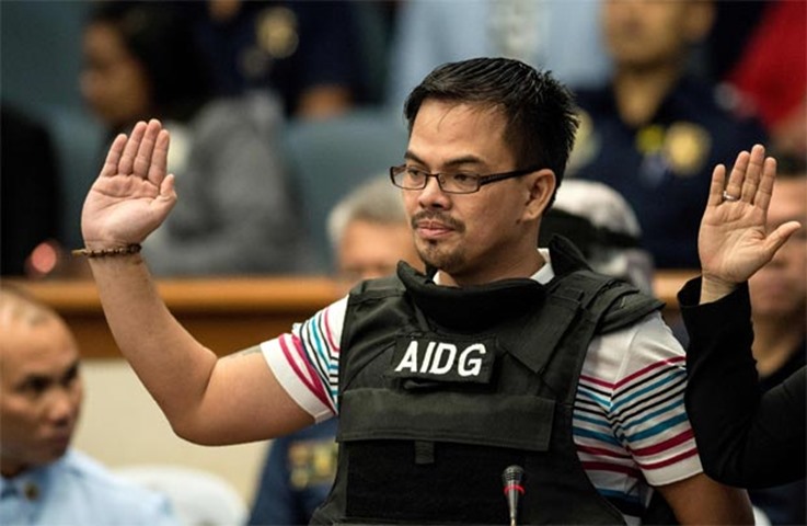 Kerwin Espinosa takes an oath during the Senate drug hearing at the Senate building in Manila