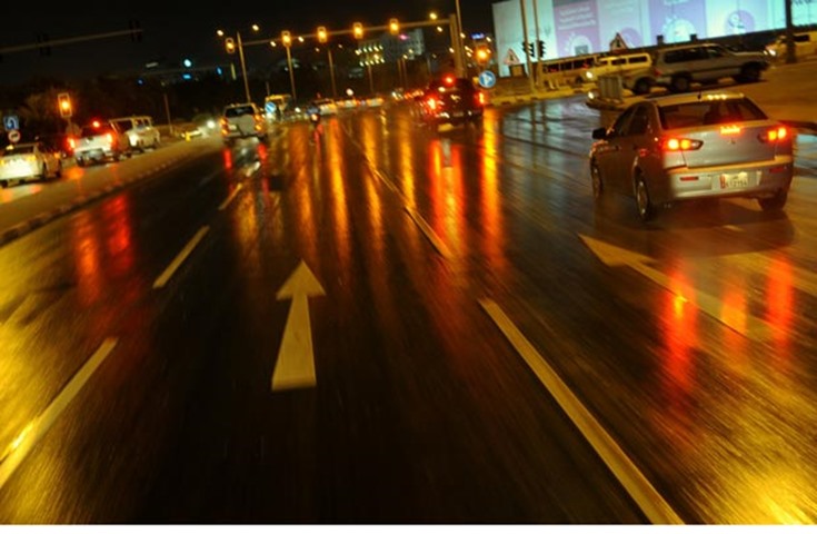 Light traffic on one of the roads in Doha after dusk fell