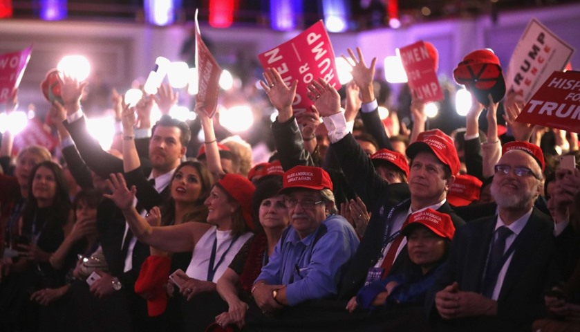 People celebrate during the call for Republican president-elect Donald Trump at the New York Hilton 
